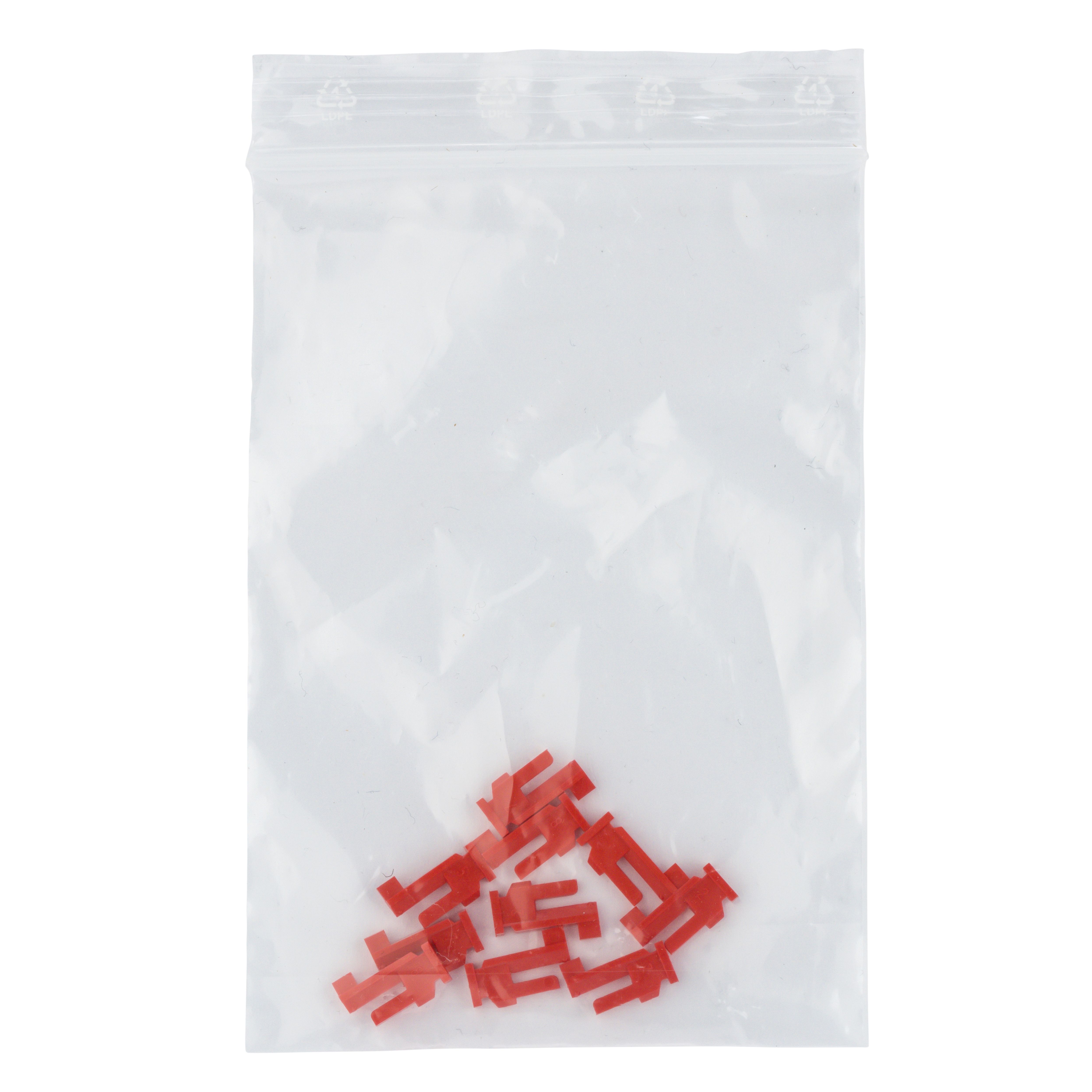 Zip-Beutel mit roten Schaltreitern zur Programmierung von Zeitschaltuhren